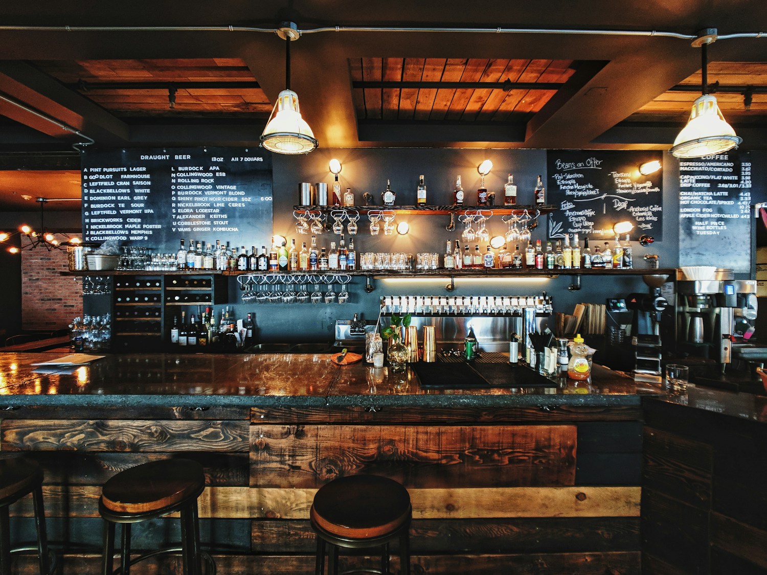 An inviting neighborhood restaurant with warm lights and tables